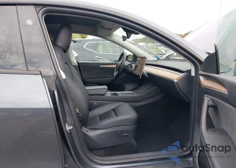 2023 Tesla Model Y Rwd из США, поврежденный, VIN 7SAYGDED6PF948385